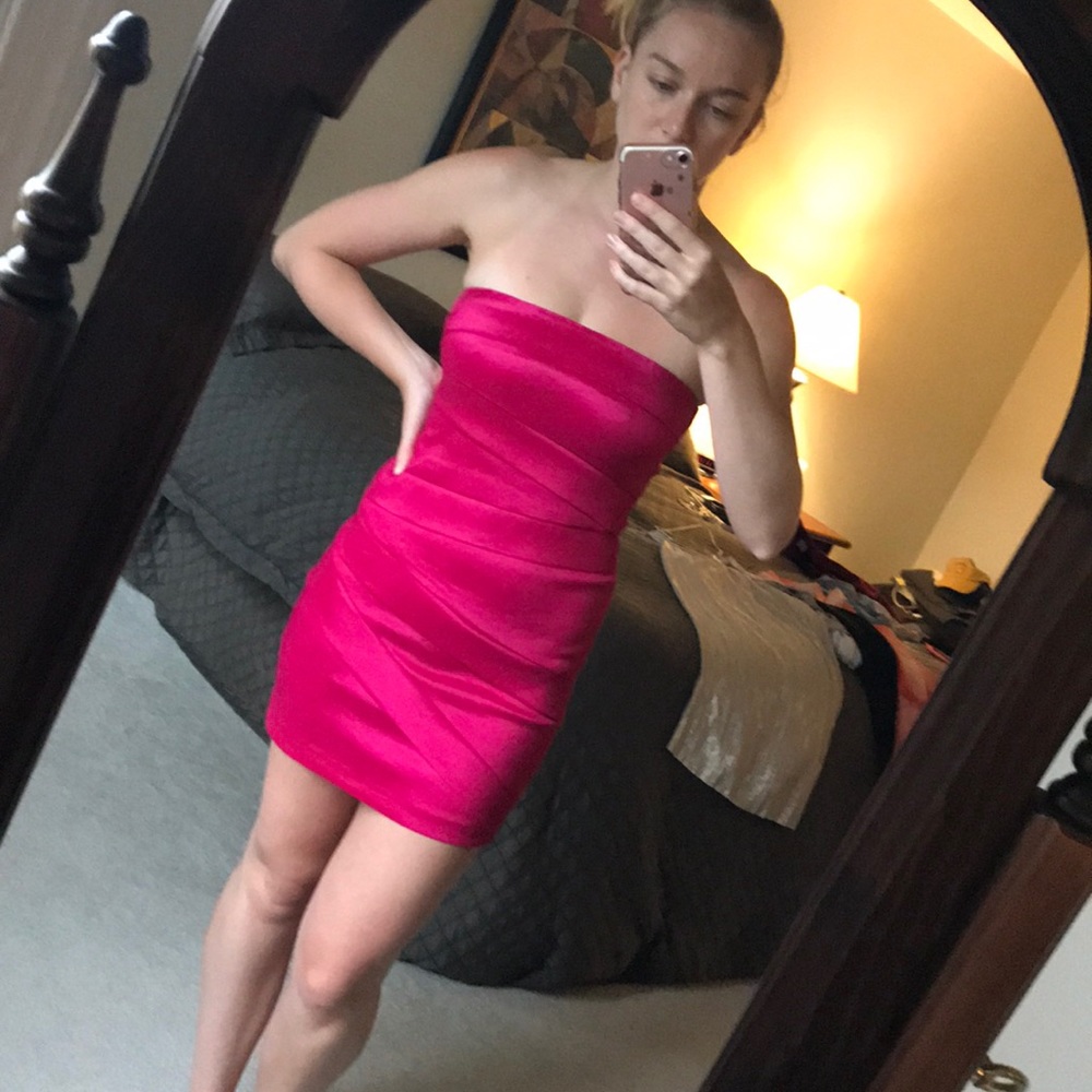 Bright pink body con dress
